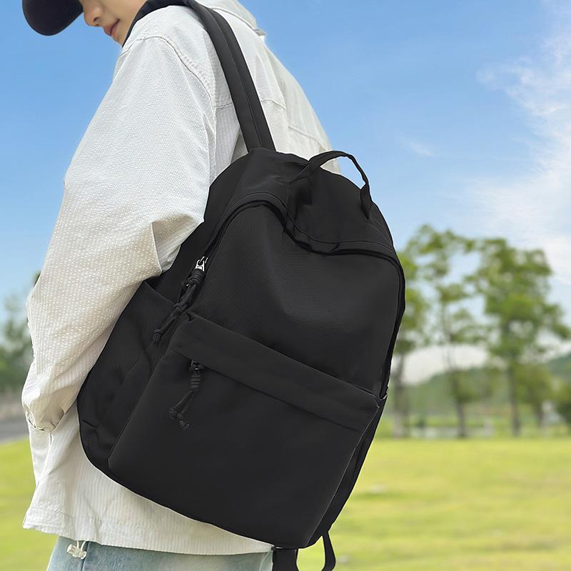 New trendy and cool men's casual backpack, junior high school student class schoolbag, women's large-capacity simple backpack