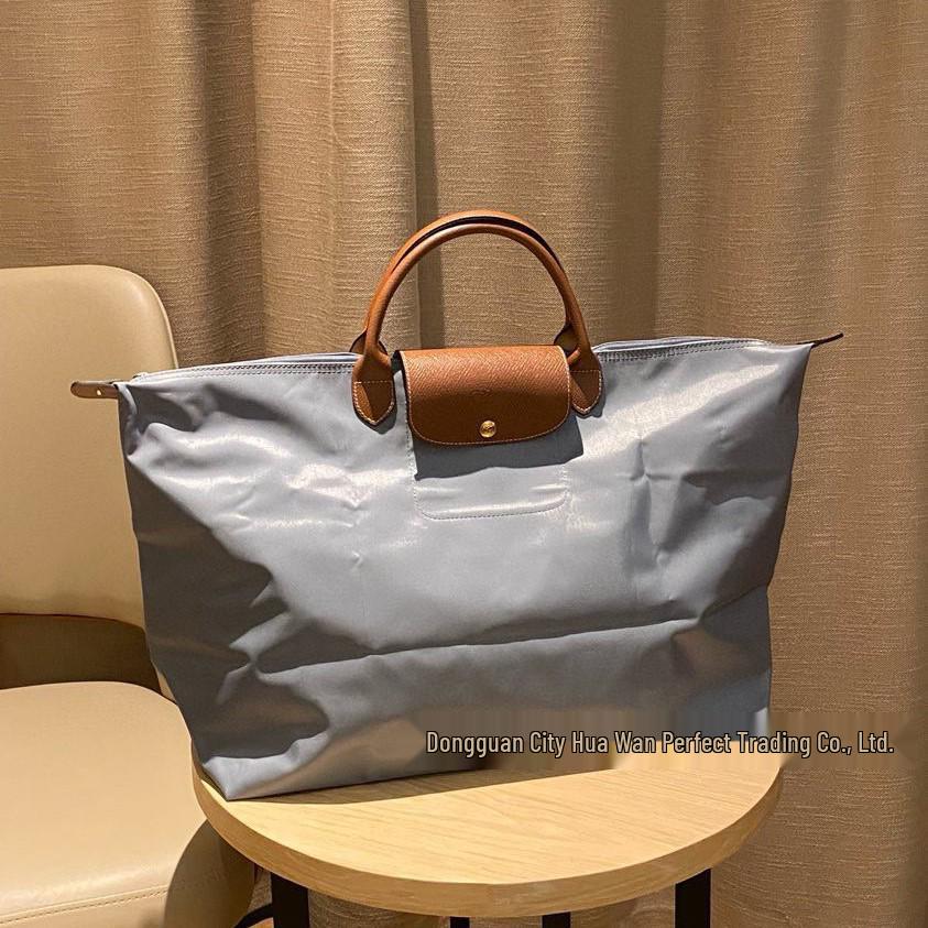 Xiangjia Large-Capacity Waterproof Oxford Travel Tote Bag, Lightweight and Foldable.