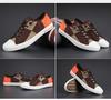 Men's Spring Canvas Shoes: Breathable, Casual, Versatile Low-Top Skate Shoes with Elastic Band.