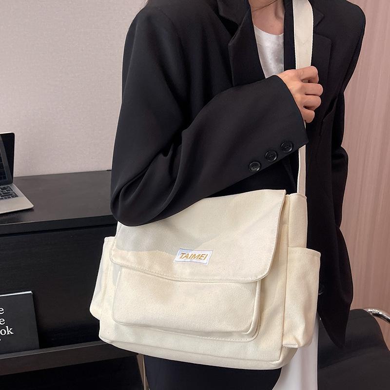 Women's Bag Solid Color Postman Bag Versatile High End Commuting Bag Niche One Shoulder Crossbody Bag