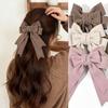 A Solid Woolen Bow Hair Clip for Autumn and Winter, a Fashionable, Simple and High-end Hair Accessory for Women