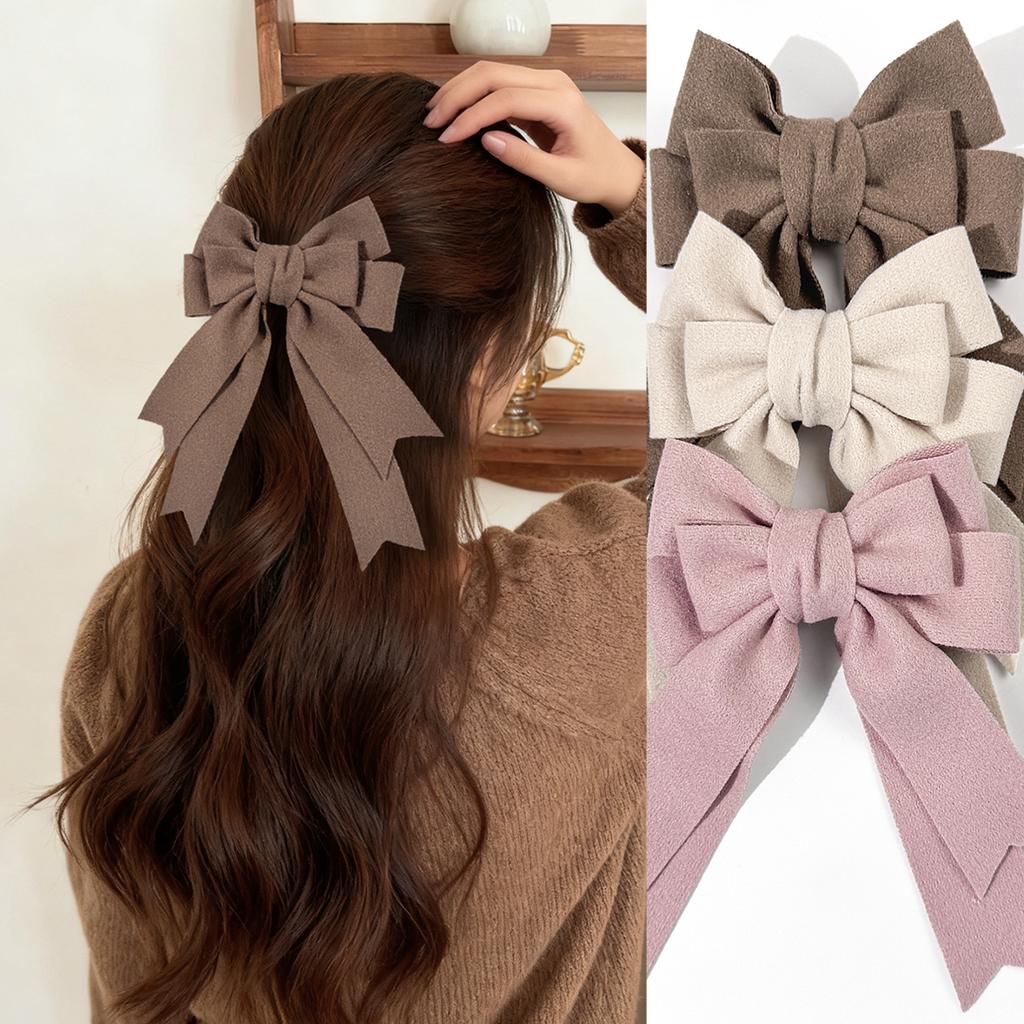A Solid Woolen Bow Hair Clip for Autumn and Winter, a Fashionable, Simple and High-end Hair Accessory for Women