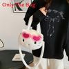 Borsa a tracolla rotonda in peluche Hello Kitty a cartoni animati con cerniera per bambine