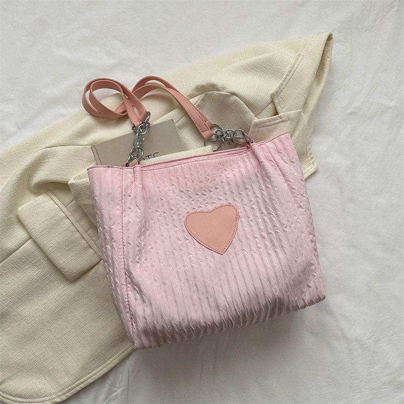 

Large-capacity shoulder bag women s 2025 spring new trend foreign-style messenger bag tote bag casual commuter women s bag рожевий