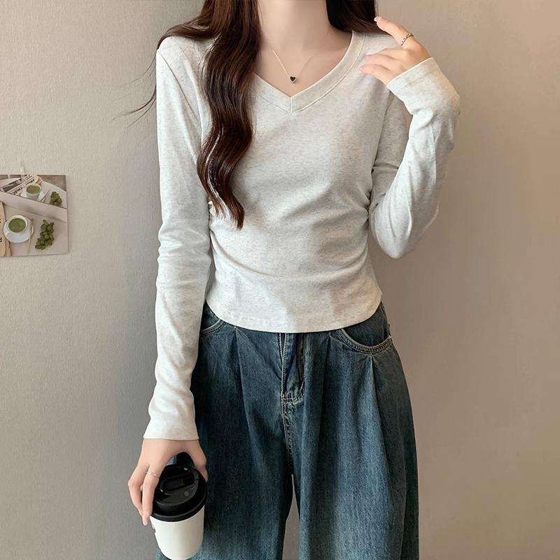 Korean v-neck slim design niche long-sleeved T-shirt for women spring and autumn irregular hem waist short hot girl top