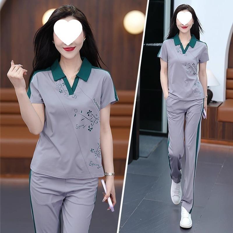 

Dopamine Fashion Casual Suit Women s Summer Age-reducing and Slimming Short-sleeved Sportswear Two-piece Set 4XL сірий колір