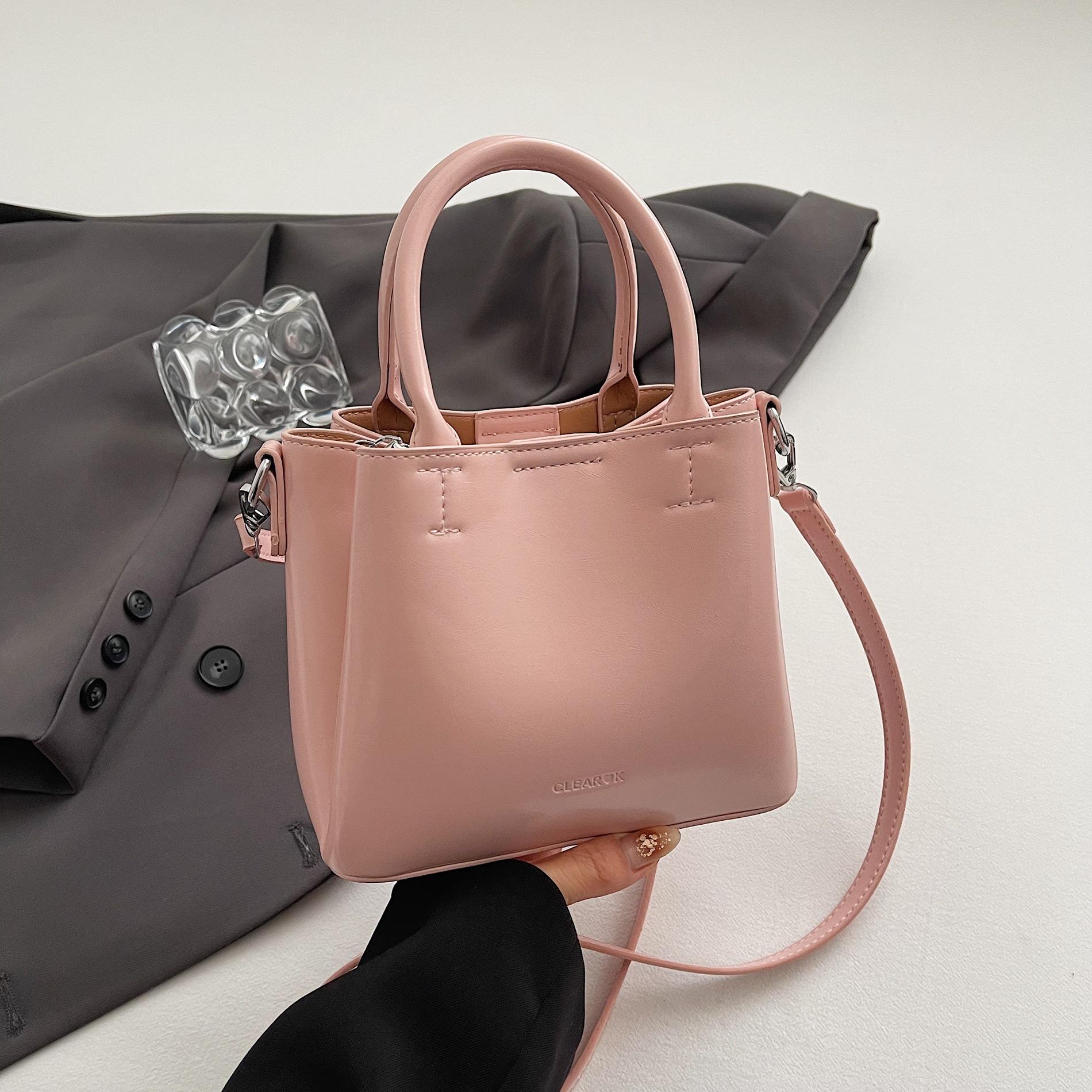 

Retro beautiful bag spring women 2025 new trend Korean portable bowling bag casual messenger shell bag розовый