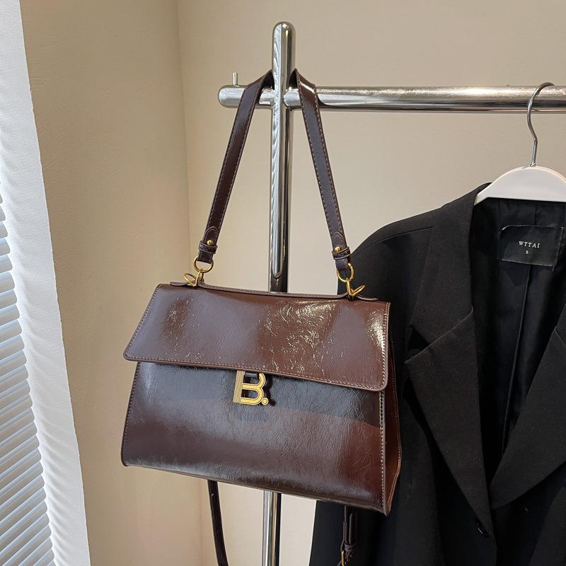 

Новая сумка высокого класса, модная, темпераментная, для通勤, портативная, на плечо, женская сумка темно-коричневого