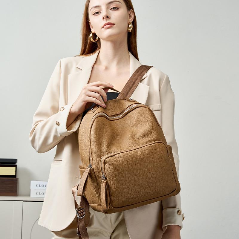 School bag, large-capacity student travel backpack, can hold computer travel, lightweight, high-end leather women's backpack.