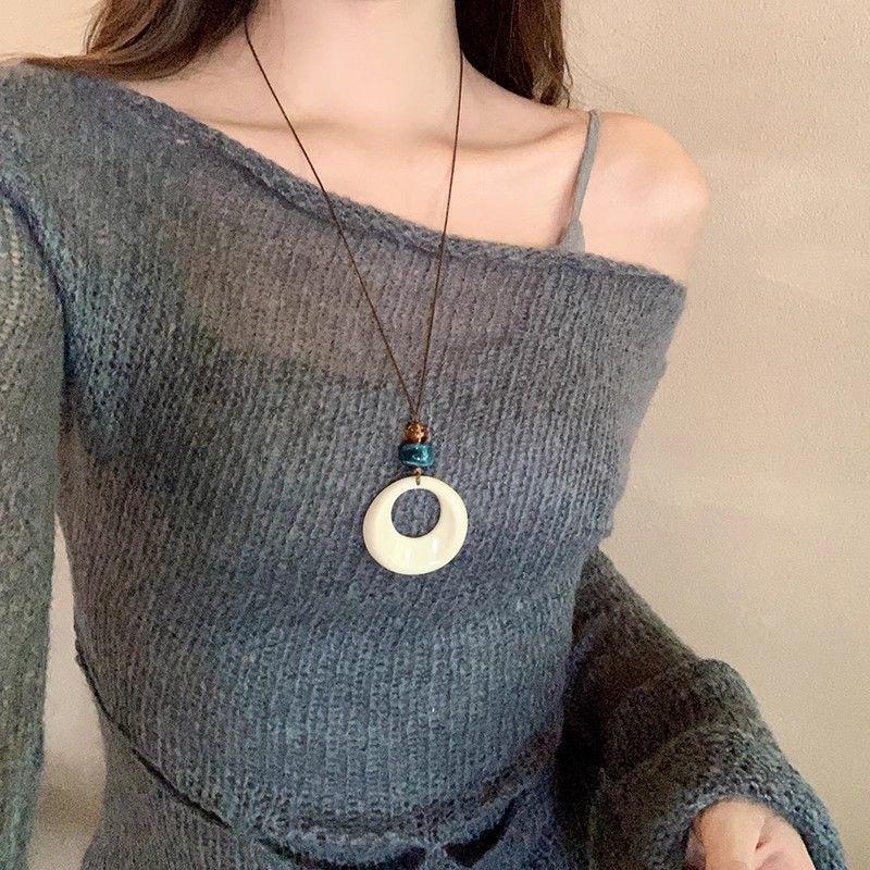 Korean Pearl Necklace: High-End Silver Clavicle Chain with Niche Design, Perfect for Light Luxury and Sweater Pendants.