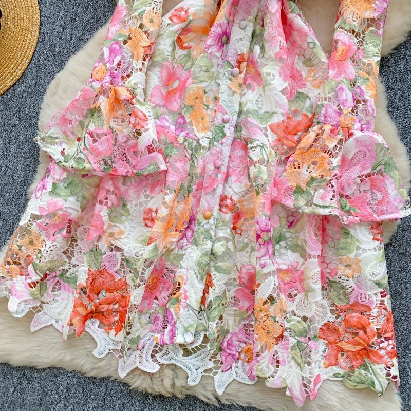 A Summer Women's Printed Dress with Flared Sleeves and Hollowed-out Crochet Design Featuring A Stylish Look