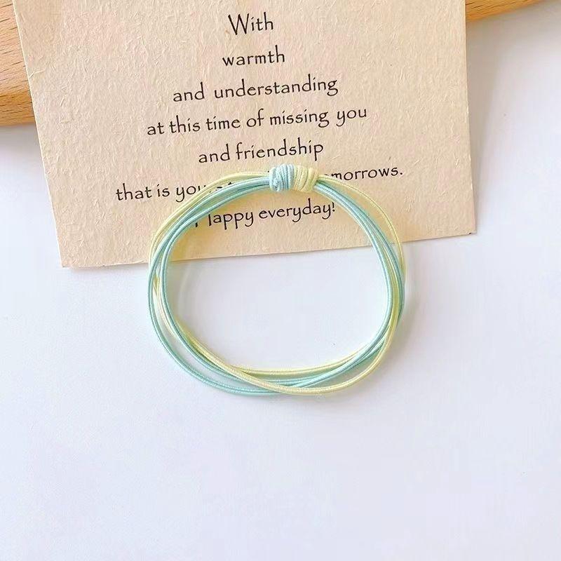 The new color matching four-strand rubber band net celebrity small fresh forest female Korean headdress girls tie hair accessories hair ring