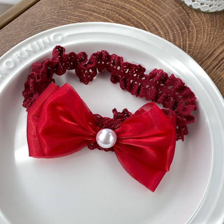 

Festive Red Baby Headband, Bow Hair Accessory for Newborns and First Birthdays, Floral Design for Girls.