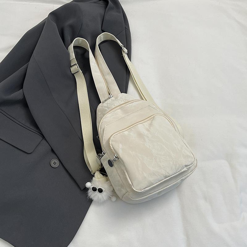 

Fashion casual large-capacity commuter bag, simple fashion breast bag, women s 2024 summer new simple fashion messenger bag Without pendant білий