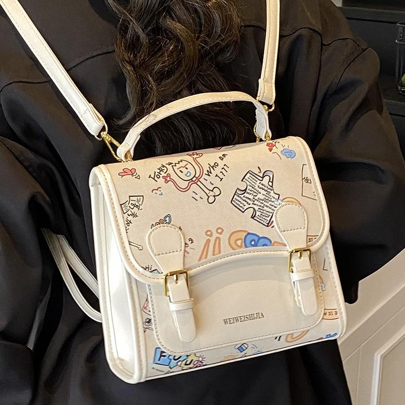Korean version of college style cute cartoon handbag women 2025 new fashion casual simple backpack student schoolbag