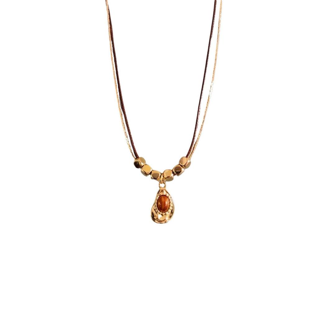 Maillard Retro Tigerauge Stein Anhänger Halskette: Exquisite Perlen-Pulloverkette für die Damen-Herbst-/Winterkollektion.