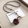 Retro Ethnic Ceramic Wood Necklace: Geometric Fruit Pendant for Women