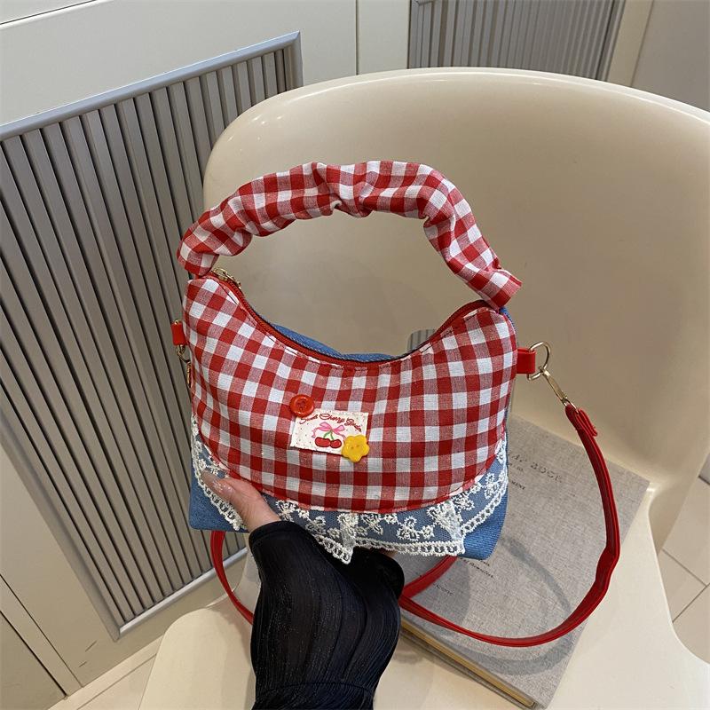 Niche design bow underarm bag women's handbag fashion shoulder messenger bag sweet baguette bag