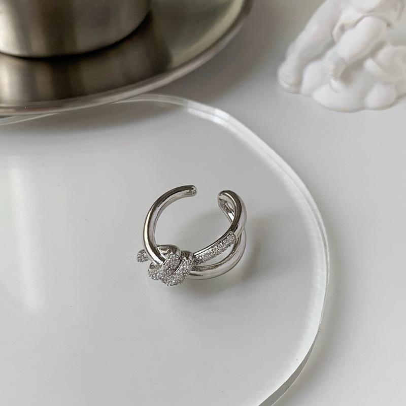

Daring Irregular Knot Ring In White Gold Finish With Geometric Shapes And Stunning Details