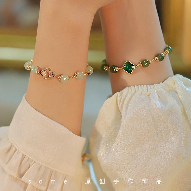 Clover*Hetian jade four-leaf clover bracelet, lucky niche design, new model that enhances complexion