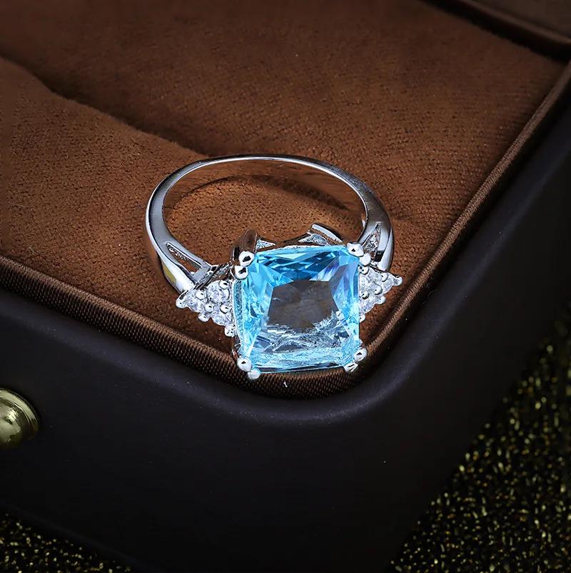 

18k Роскошное медное женское кольцо с благородным синим кубическим цирконием Элегантное женское кольцо Модная бижутерия Ювелирное украшение для вечеринки Свадебное украшение Подарок 10