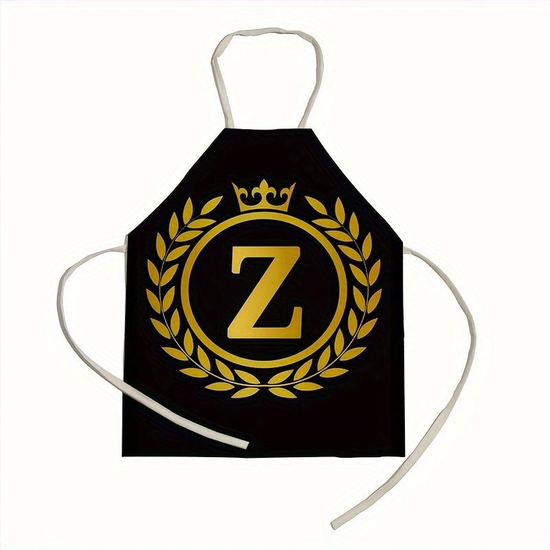 1 personalized letter apron with golden crown print on a black background, suitable for kitchen baking and barbecue