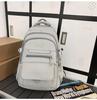 Schoolbag high-value simple casual couple travel backpack large capacity junior high school students multi-compartment backpack men