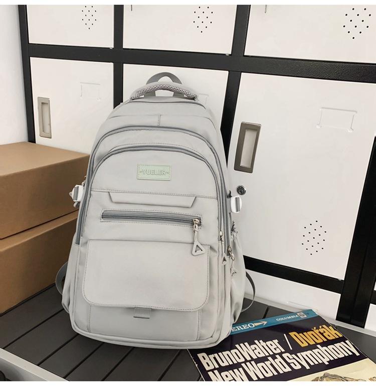 Schoolbag high-value simple casual couple travel backpack large capacity junior high school students multi-compartment backpack men