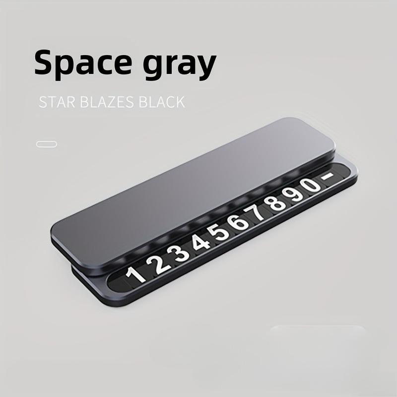 

The new temporary parking number plate can hide the phone number display function and is a car interior accessory сірий