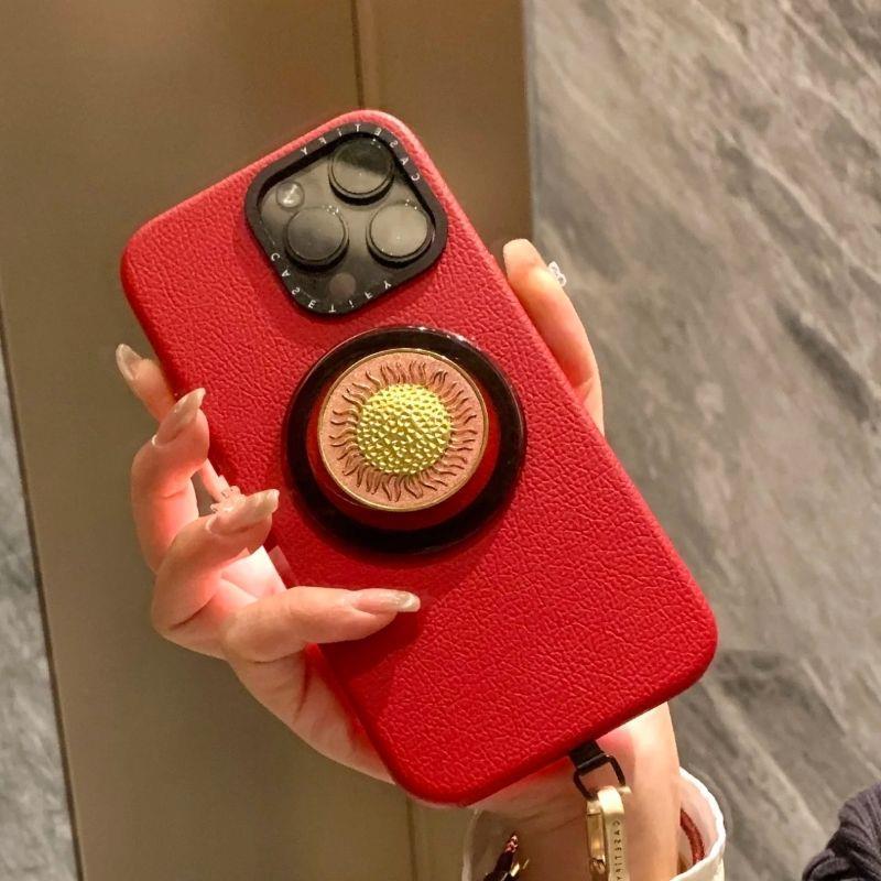 

High-Strength Magnetic Sun Heart Phone Bracket with Telescopic Airbag and MagSafe Compatibility.
