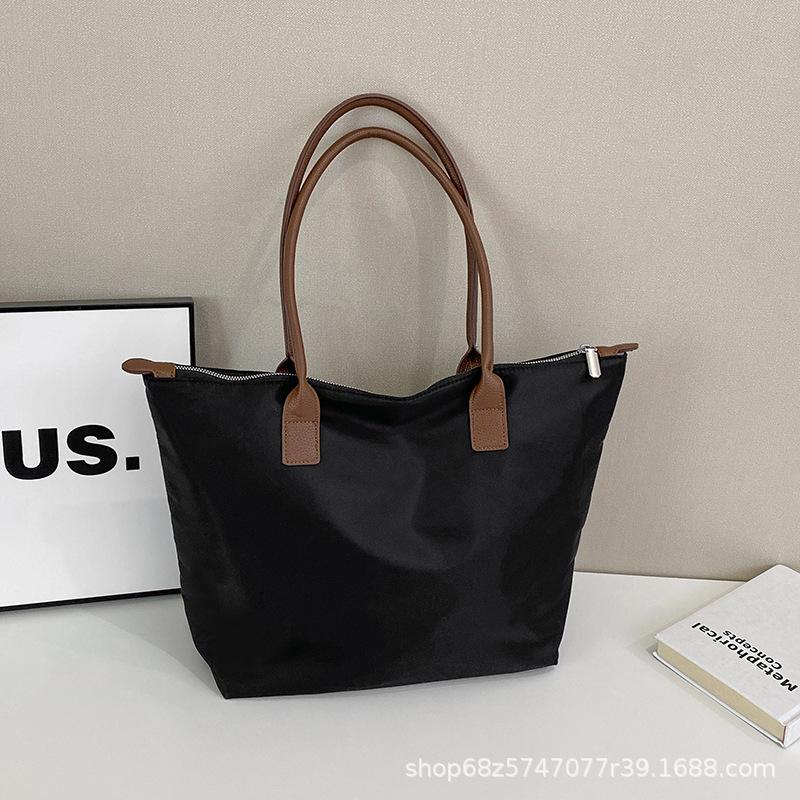 

Simple women s bag tote bag versatile handbag 2025 new anti-splashing Oxford cloth shoulder bag underarm bag чорний