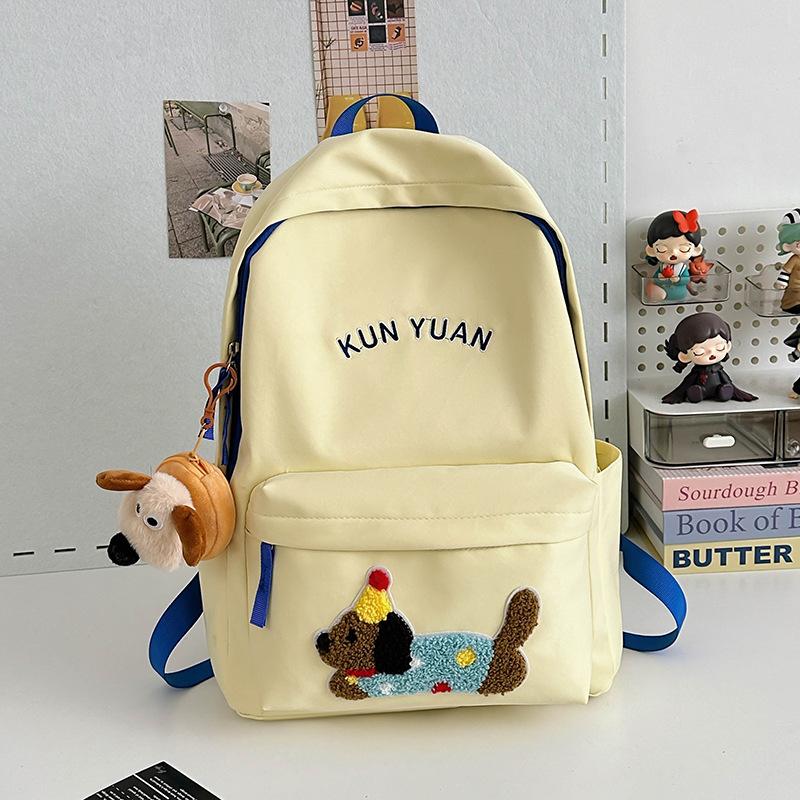 Schoolbag new cute puppy backpack large capacity primary school students junior high school students lightweight schoolbag simple fashion alphabet 