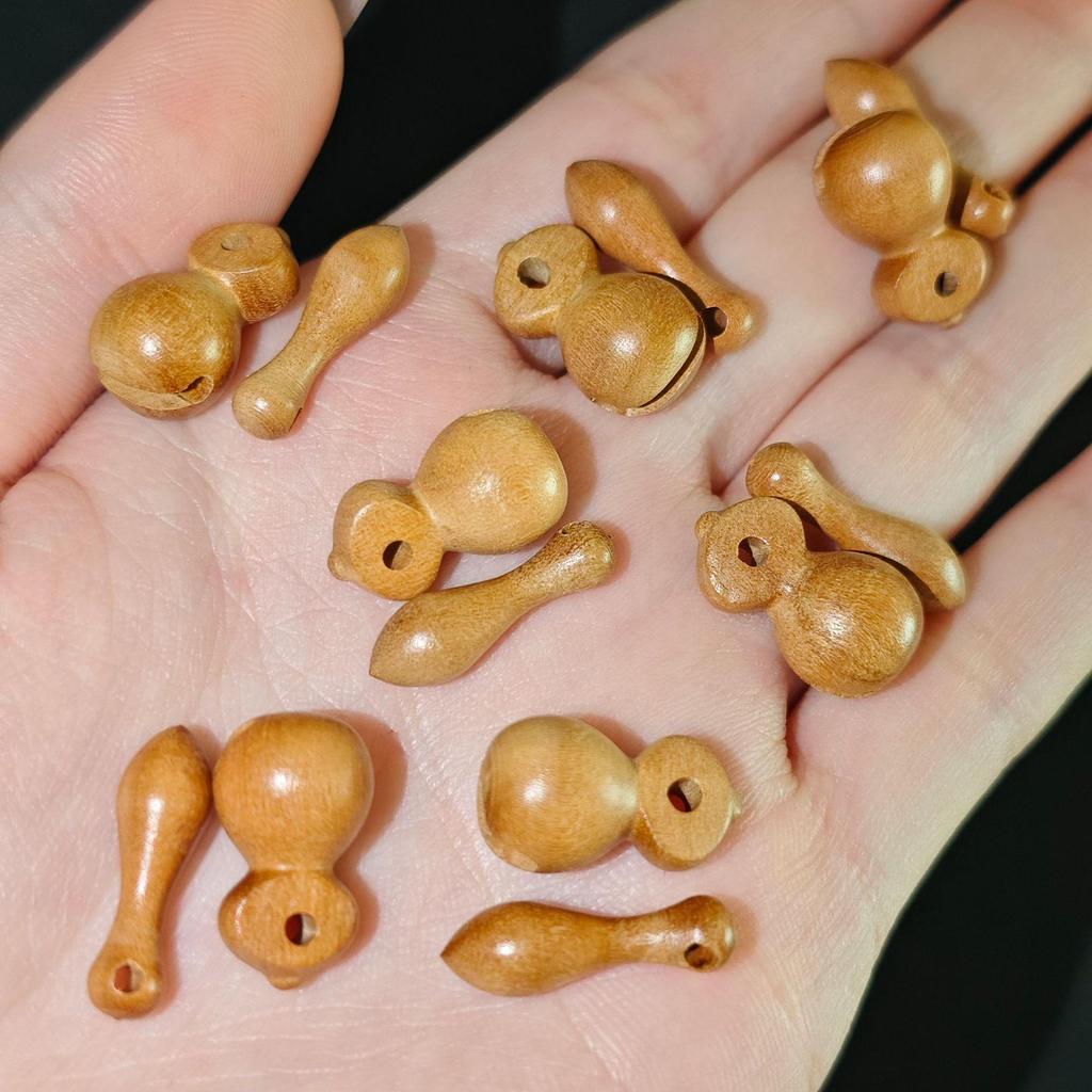 Mindful Peach Wood Fish Beads Bracelet with Carved Wooden Pendant