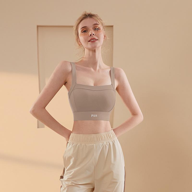 

Женский спортивный бюстгальтер с высокой степенью поддержки, моделирующий и стильным дизайном спинки Large кремовый/кофейный