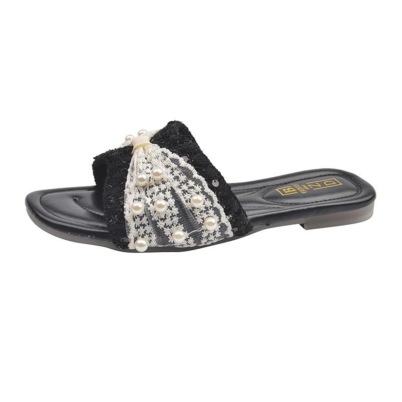 2025 neue Trage flache Strand Ein-Wort-Sandalen Mode mit Rock Internet-Berühmtheit kleiner Duftwind Perlen-Slipper Damen Sommer