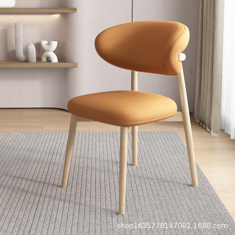 Nordic Modern Minimalist Solid Wood Dining Chair with Soft Pack Backrest - Comfortable Light Luxury Ram's Horn Design for Home, Restaurant, and Hotel.