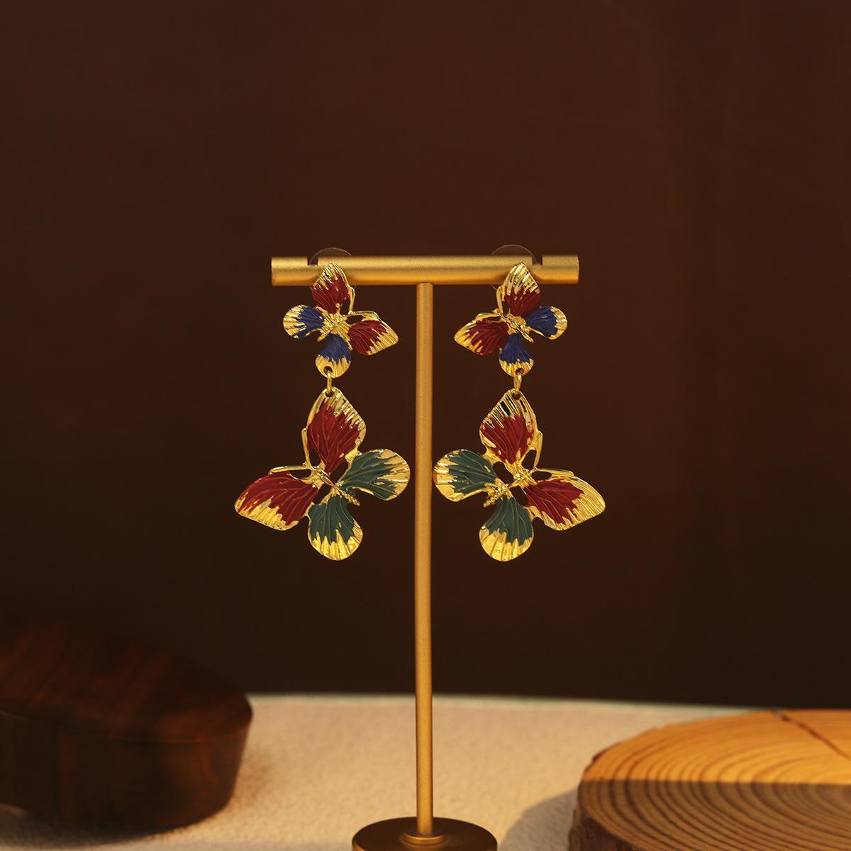 Retro-style double butterfly drop earrings for women elegant ear studs