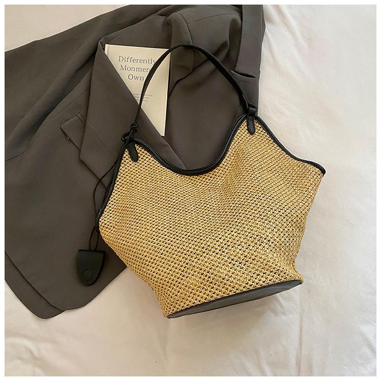 Summer new woven straw bag women's fashion niche shoulder bucket bag seaside beach bag