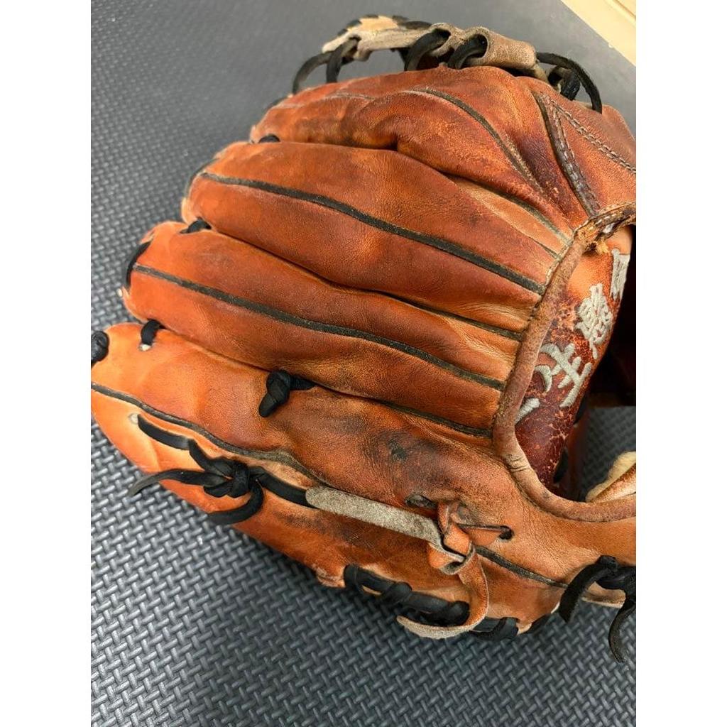 Used Kubota Slugger Hard Glove