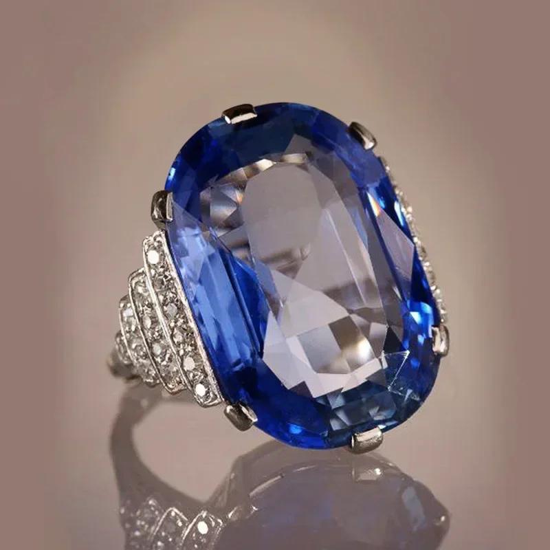 Nuovo Anello da Donna Hyperbole per Festa Cocktail Con Enorme Zircone Cubico Azzurro Montatura a Griffa Regalo di San Valentino per Moglie