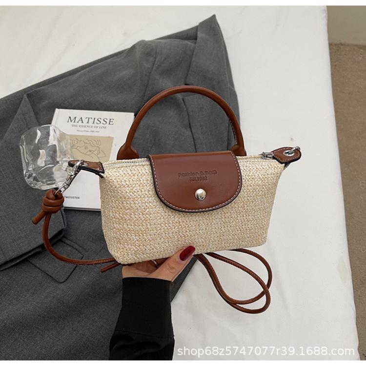 Summer mini woven portable small bag women's 2025 new shoulder messenger bag beach vacation small bag bucket bag