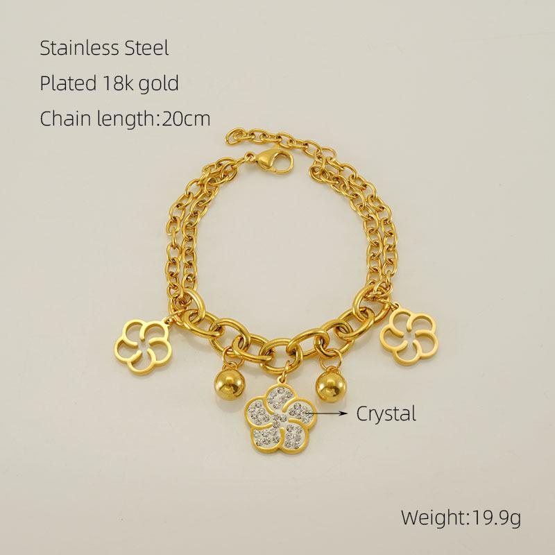 

Браслет из нержавеющей стали с позолотой 18 карат и цветком из стразов золотой