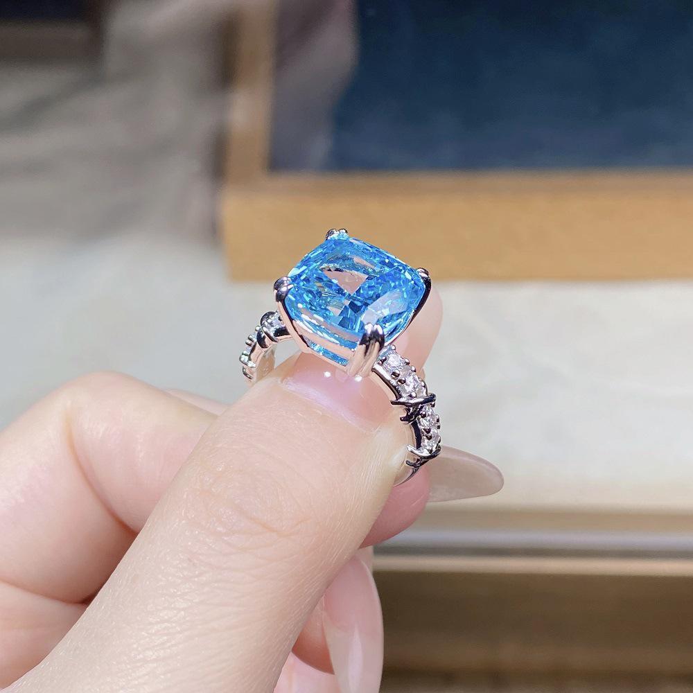 Exquisite S925 Silver Square Sugar High Carbon Diamond Women's Ring with Aquamarine Accent - Bold European/American Style.
