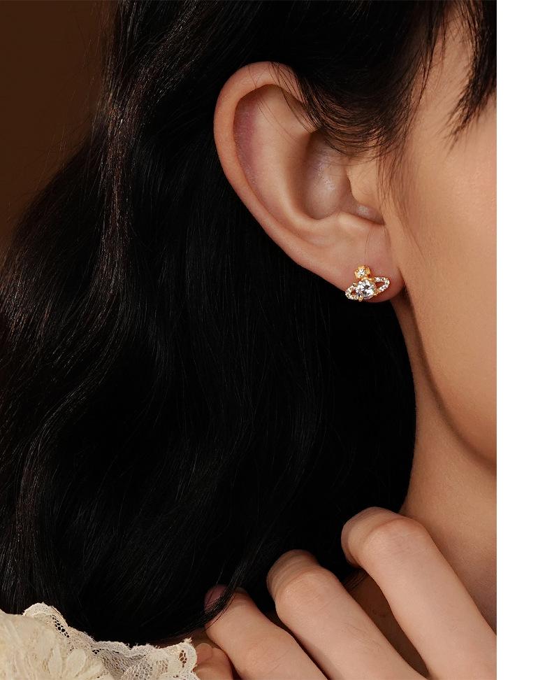 Ohrstecker Saturn aus S925 Sterlingsilber im koreanischen Stil für Damen - Mit Diamanten besetzt, super glänzend, kleines leicht luxuriöses Zirkon-Design