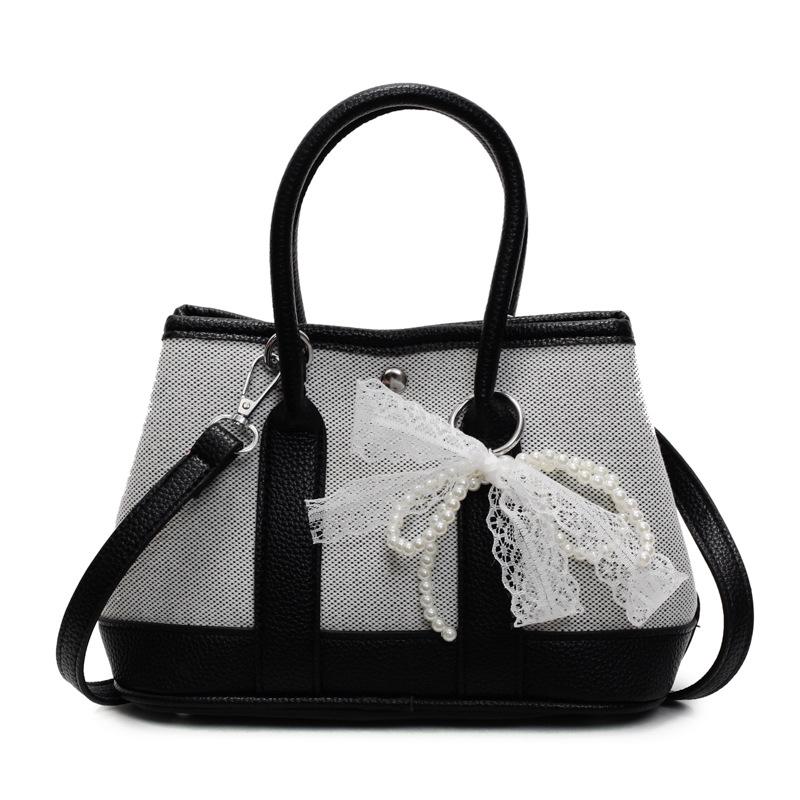 Wholesale Korean version of casual niche contrasting color portable bucket bag commuting versatile simple personality messenger women's bag