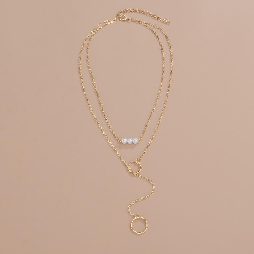 Fashion exaggeration, geometric ring circle pearl pendant, multi-layer stacking design women's long necklace necklace necklace