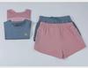 Women's Breathable Summer Yoga and Running Set: Loose Fit, Quick-Drying Shorts with Short Sleeves.