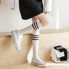 4 pairs of women's sporty 3-line knee socks