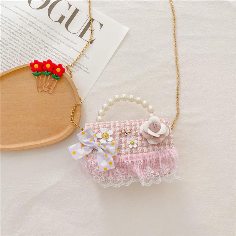 Стильная детская сумочка мини-размера с очаровательным бантом и прочной тканью Style One