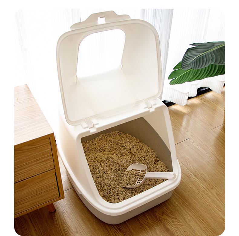 Uzavřená kočičí toaleta s odklápěcím víkem, deodorizační funkcí a lopatkou, odolná proti stříkající vodě a nadměrně velká pro snadné čištění